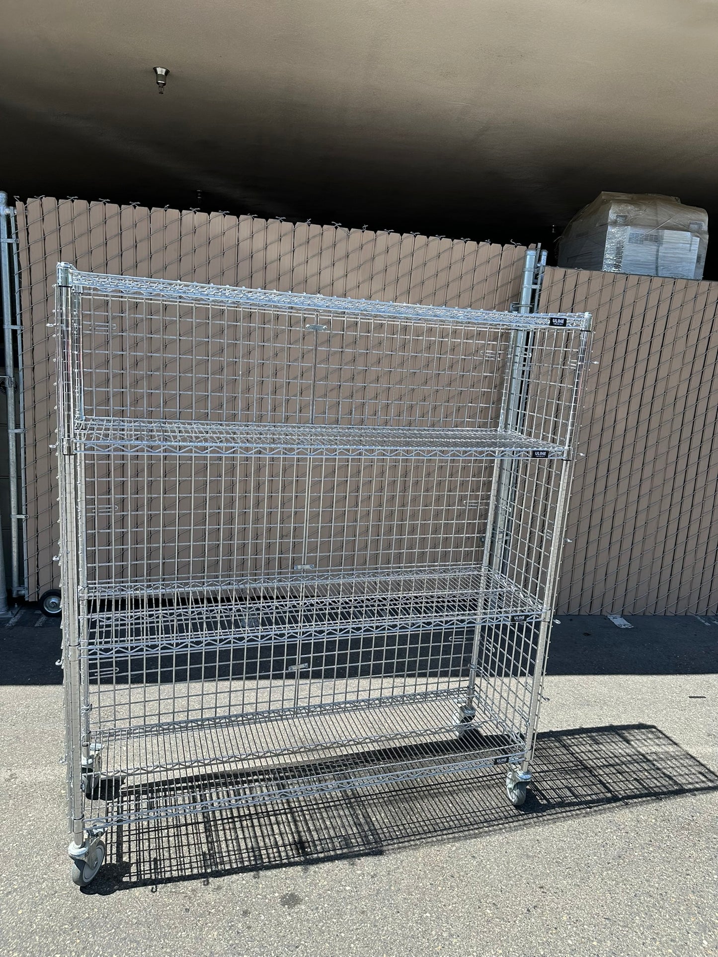 ULINE H-2658 Three-Shelf Cart 60 x 18 x 69" 1000lbs Capacity, Enclosed, No Doors