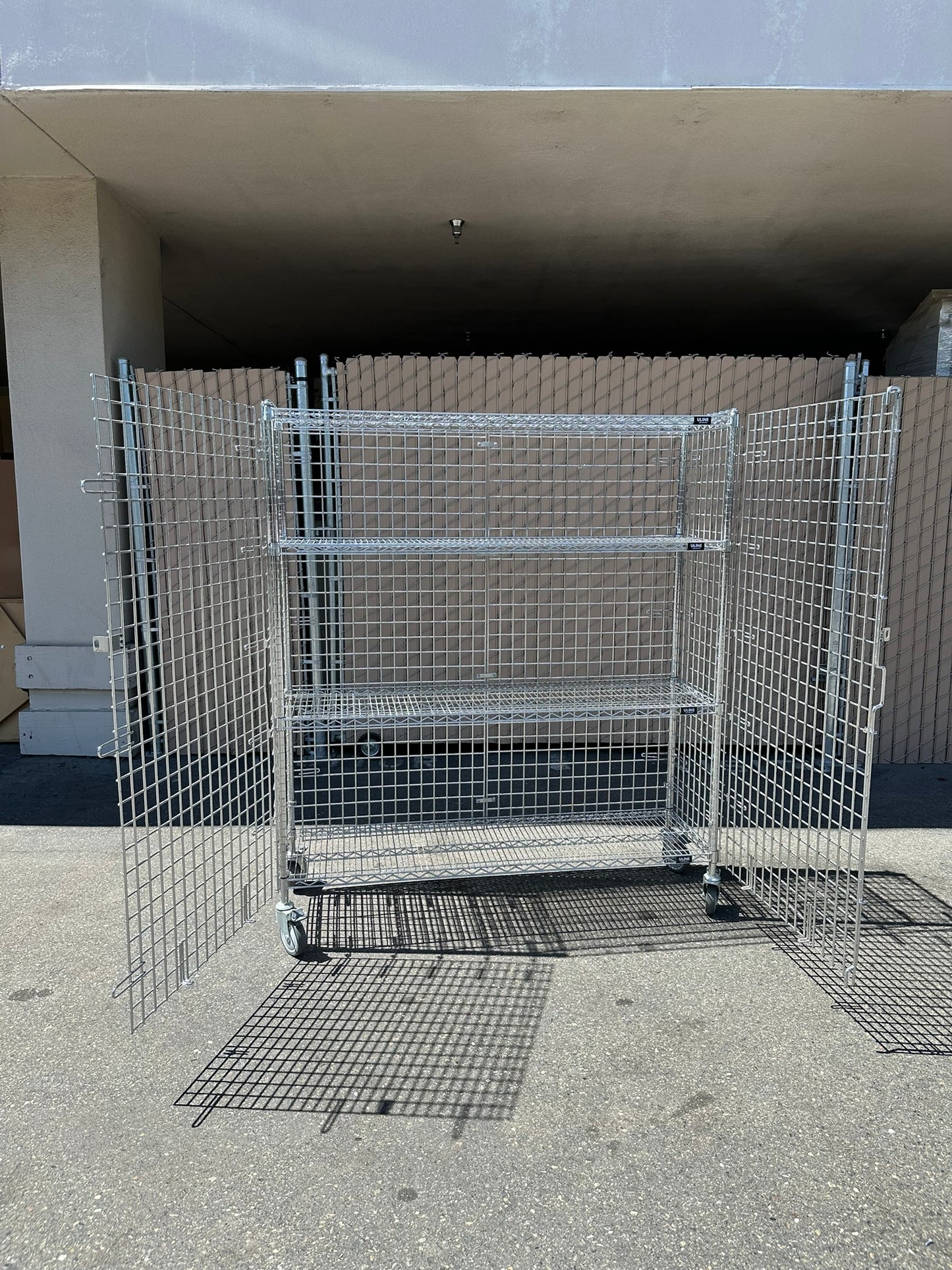 ULINE H-2658 Three-Shelf Security Cart 60 x 18 x 69" 1000lbs Capacity