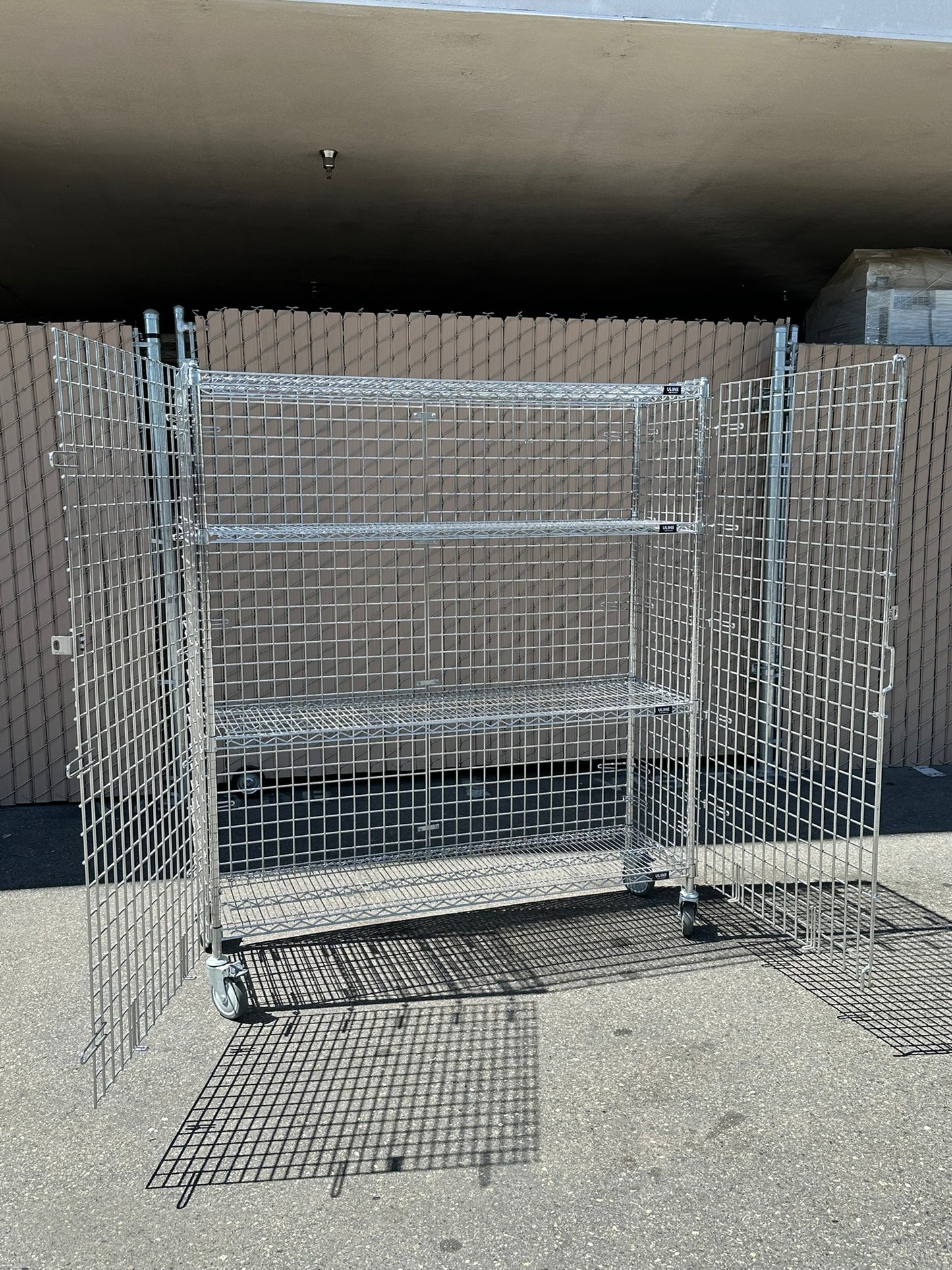 ULINE H-2658 Three-Shelf Security Cart 60 x 18 x 69" 1000lbs Capacity